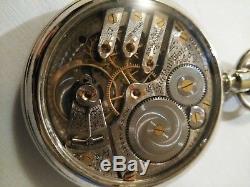 Elgin 16S. 17J. Adj. Mint fancy dial 3 f. B. Gold trimmed movement display case