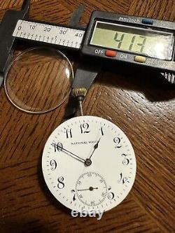 Vintage pocket watch Mechanical movementand Rubis Avance/Retard National Watch